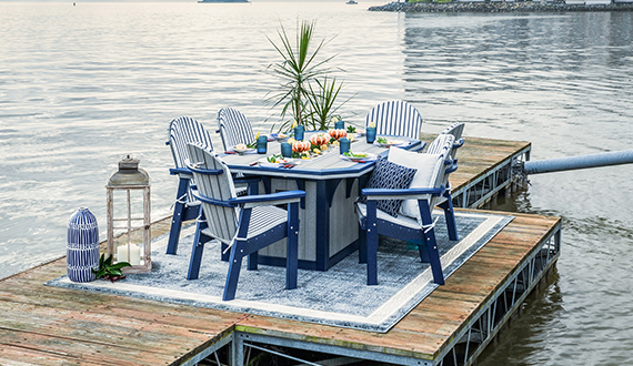Outdoor dining table and chairs on the dock.