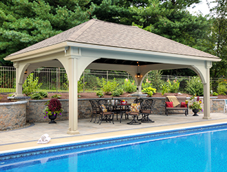 Poolside pavilion over an outdoor dining area.