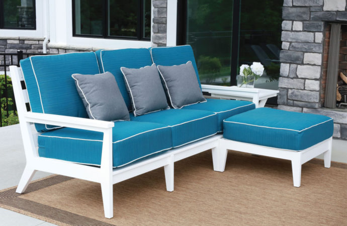 Poly furniture set with a cushioned ottoman.