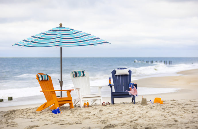 Adirondack Chairs on a beach.
